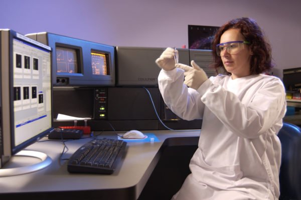 Scientist using a Flow Cytometer
